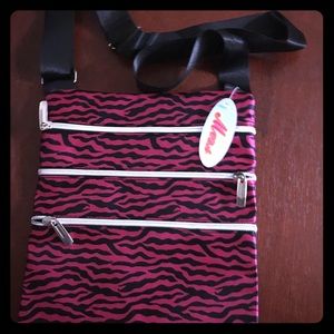 4 zipper pink zebra striped crossbody bag.